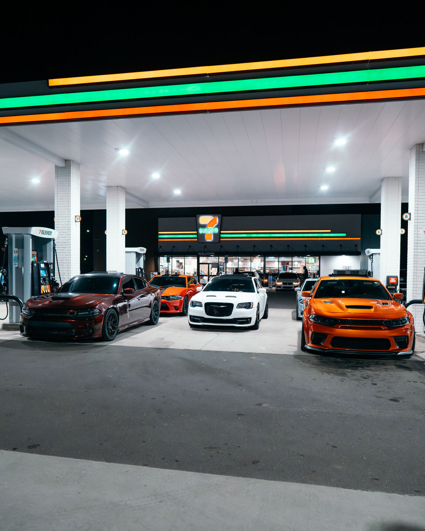 Corvette and Chargers lined up in a garage with showroom-quality detail finishes